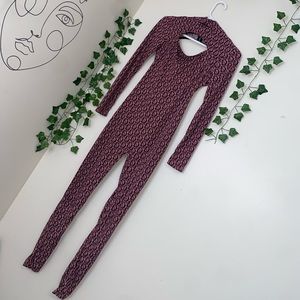 Sexy cut-out back jumpsuit , comfortable and stretchy . No sign of wear on it .